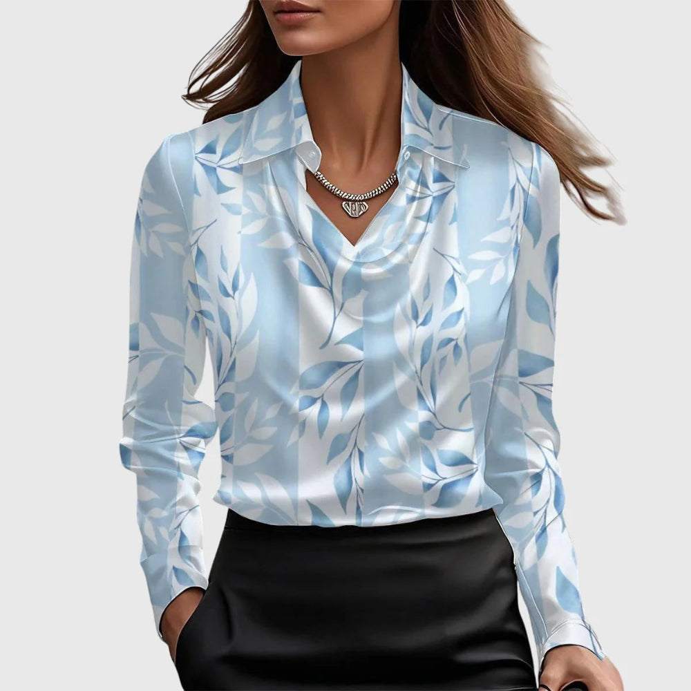 Blouse au brillant luxueux avec col plissé